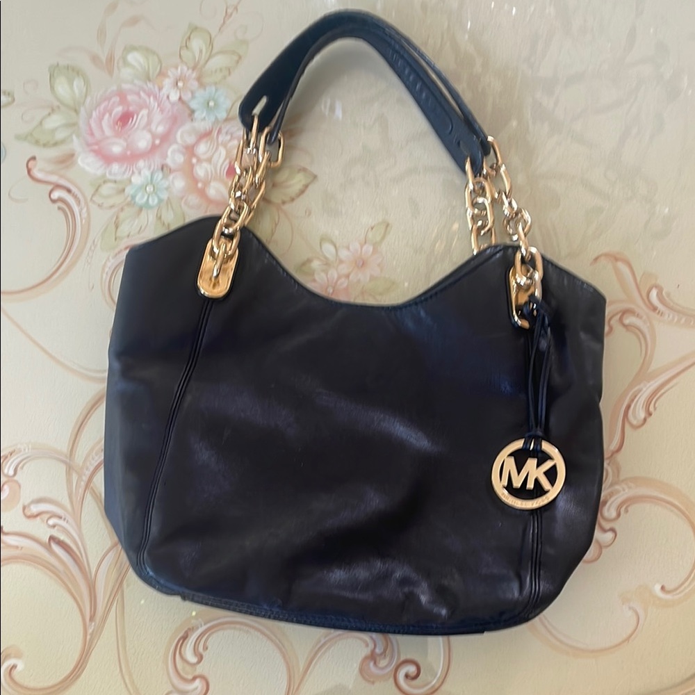 Michael Kors Black and Gold Shoulder Bag with Slouchy Silhouette